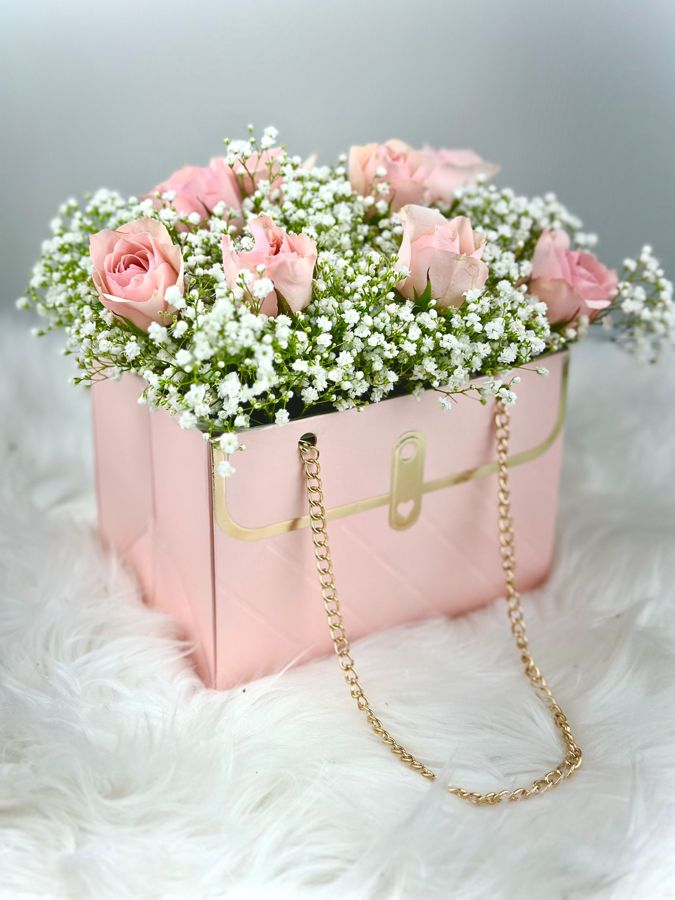 Pink roses and baby's breath in a blush gift box