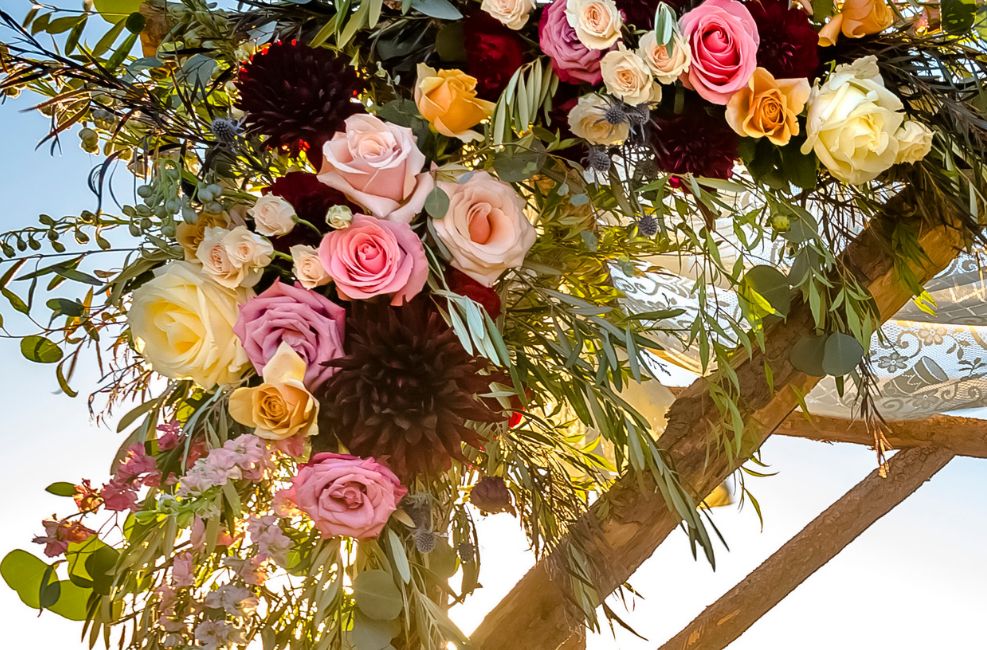 Wedding arch florals with garden roses